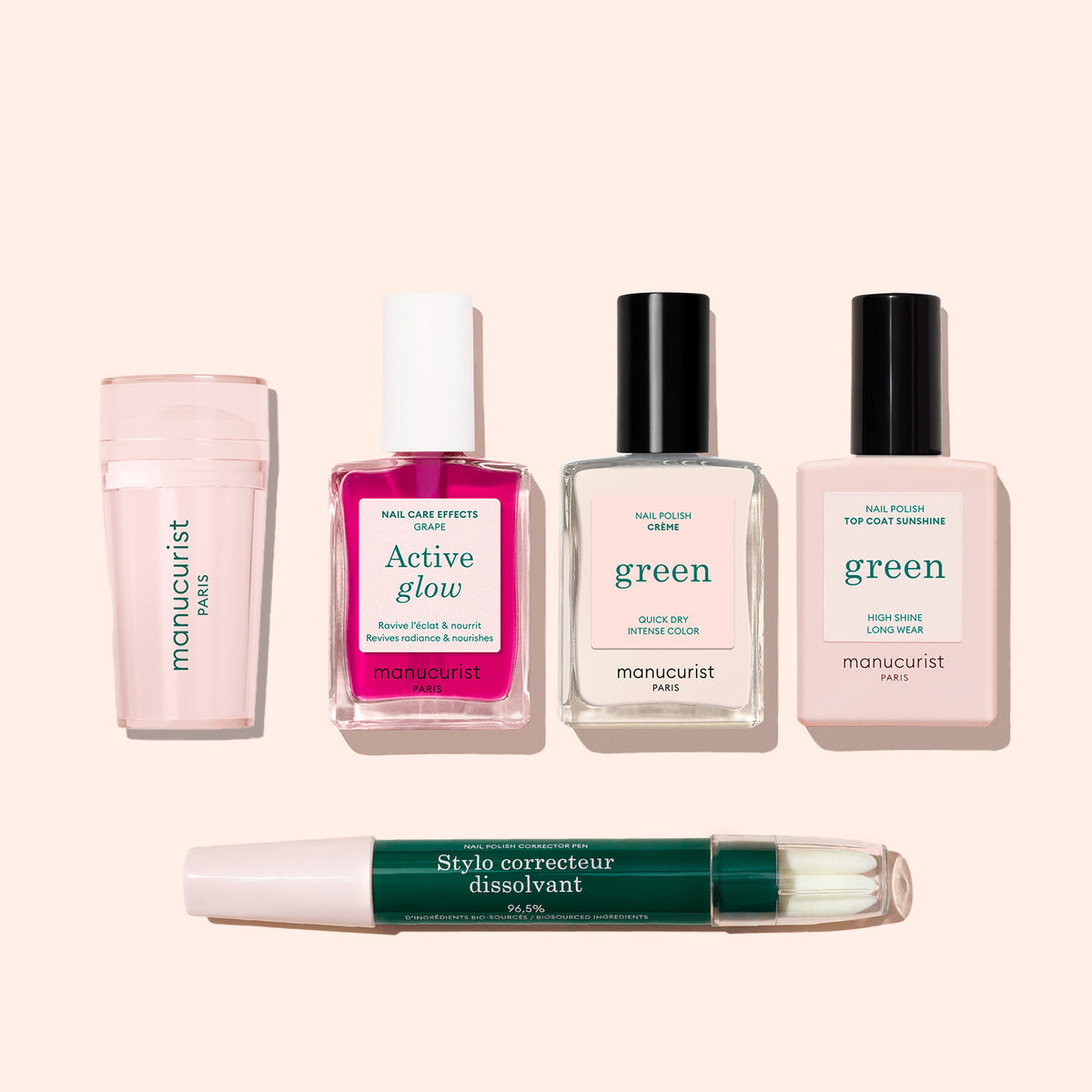 Five manicure products from the Manucurist French Active™ Kit on a light beige background: nail file, pink nail care serum, remover, two pale pink polishes for French tips, and a green white corrector pen.