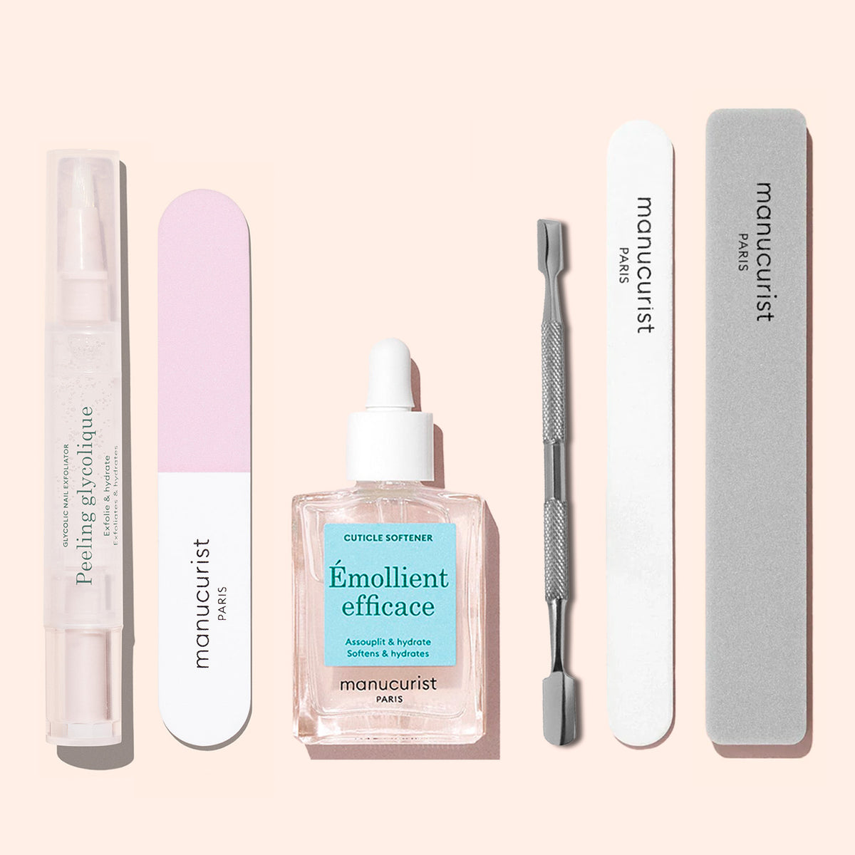 The Manucurist Glossy Booster Duo is a Japanese manicure set featuring a cuticle softener in a dropper bottle, metal cuticle pusher, peeling gel pen nail exfoliator, and three nail files for glossy nails.
