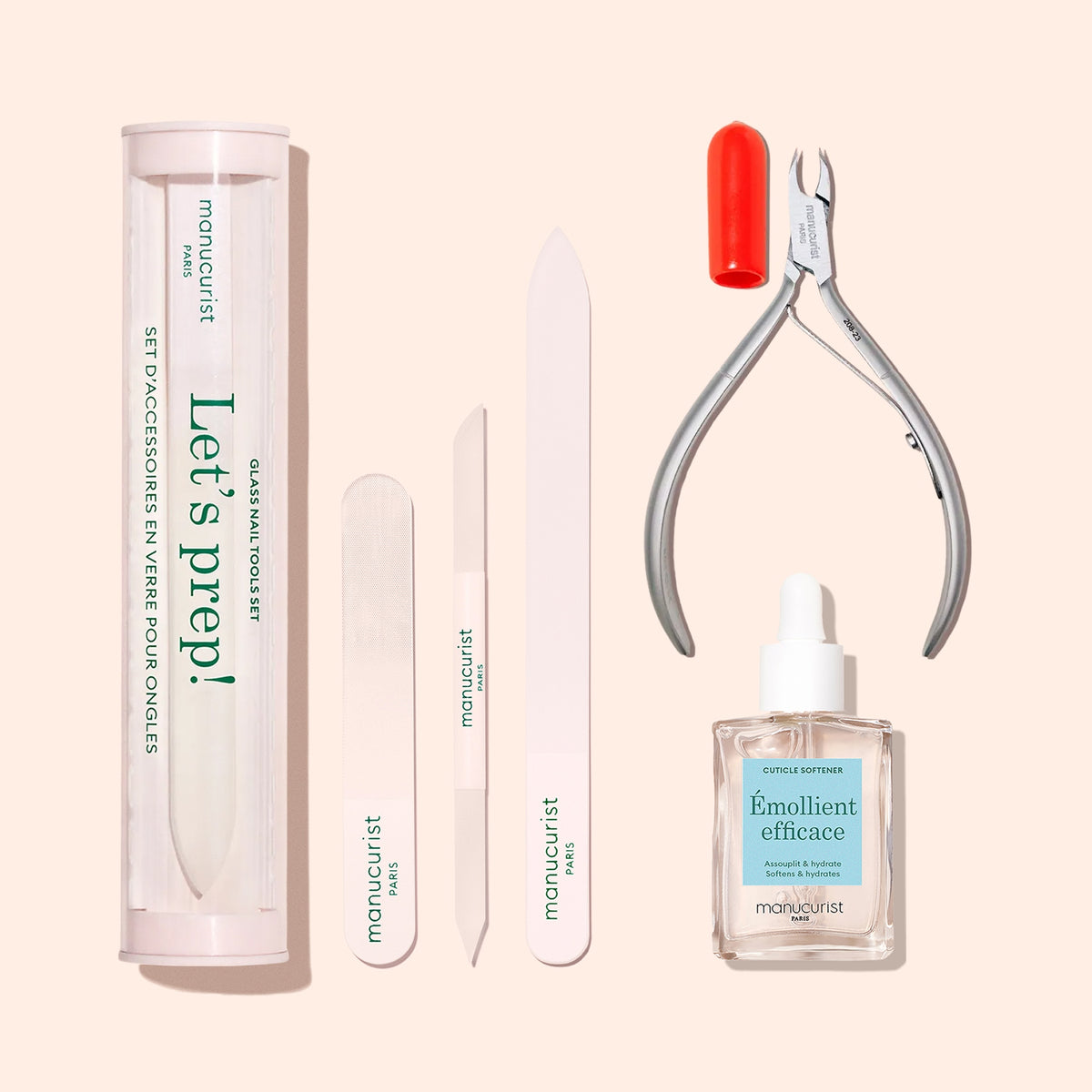 Le set de préparation des ongles Manucurist comprend une lime émeri professionnelle en tube, un polissoir, une lime à ongles blanche et en verre, une pince à cuticules en métal et un émollient pour cuticules, présentés sur un fond pêche clair.