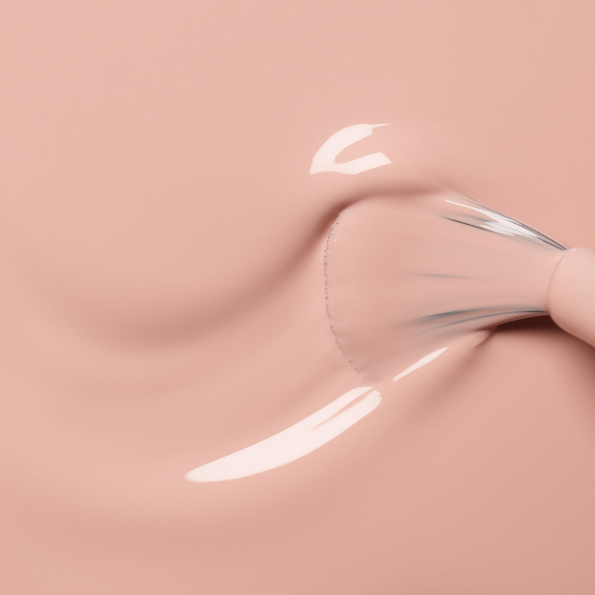 A brush applies Manucurist&