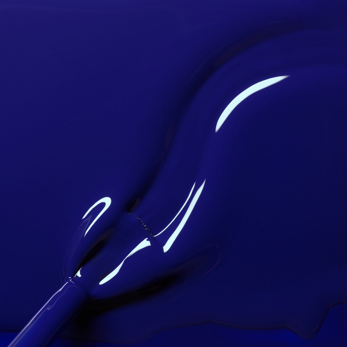 Close-up of a brush applying Manucurist&