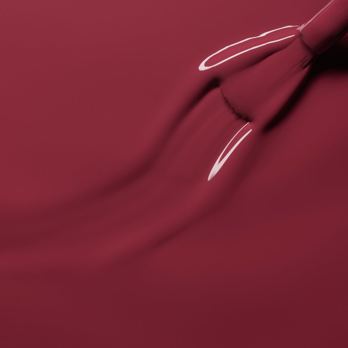 A close-up of a brush applying Manucurist&