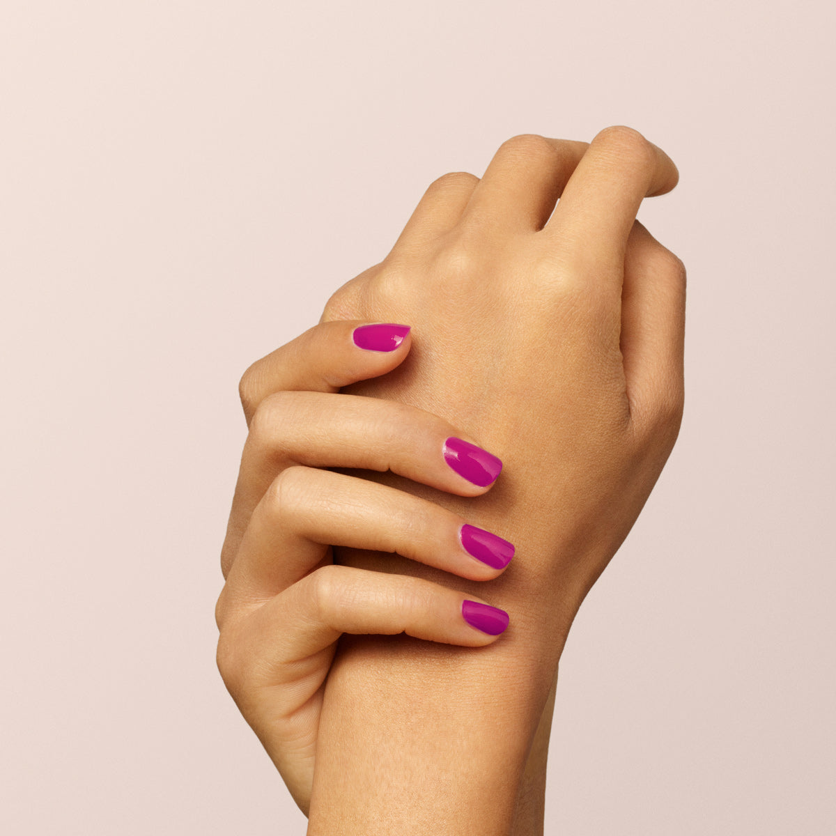 Two hands with neatly manicured nails showcase Manucurist&