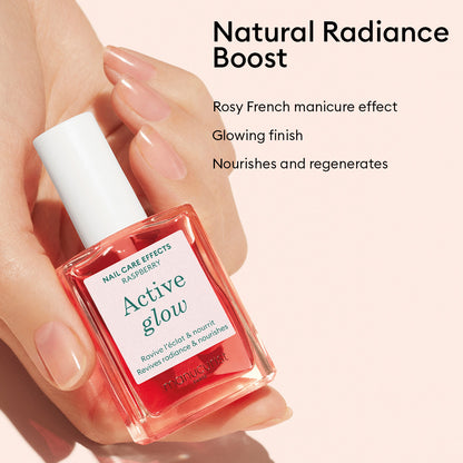 A hand holds a pink bottle of French Manicure Glow by Manucurist. Text: Natural Radiance Boost. Rosy French manicure effect, gel-like shine, glowing finish, nourishes and regenerates nails.