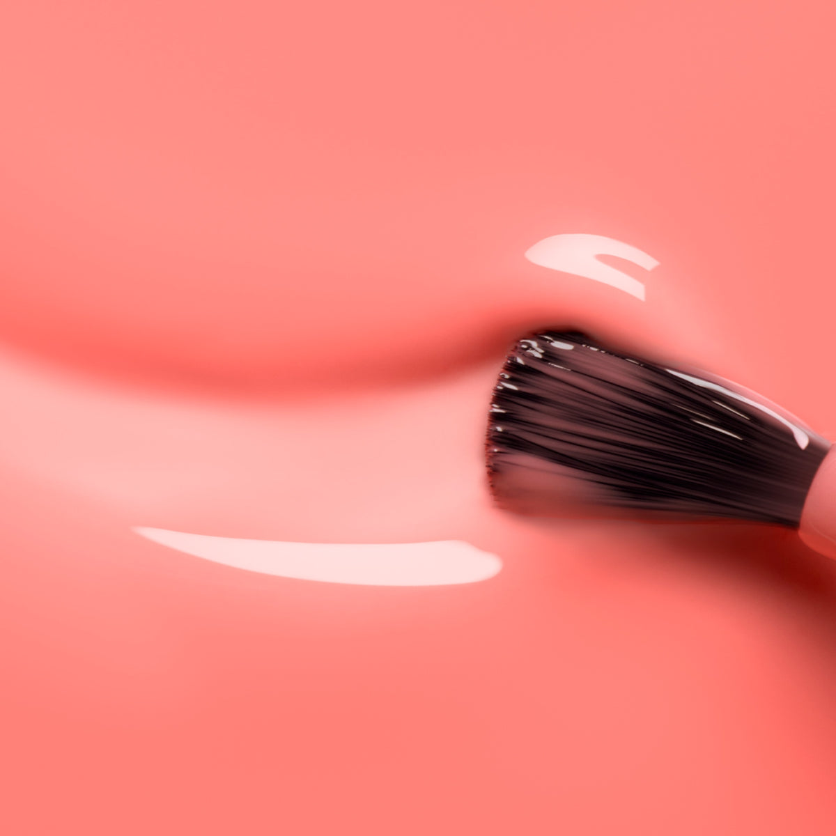 A close-up of a nail polish brush applying Manucurist Glacé Jelly&