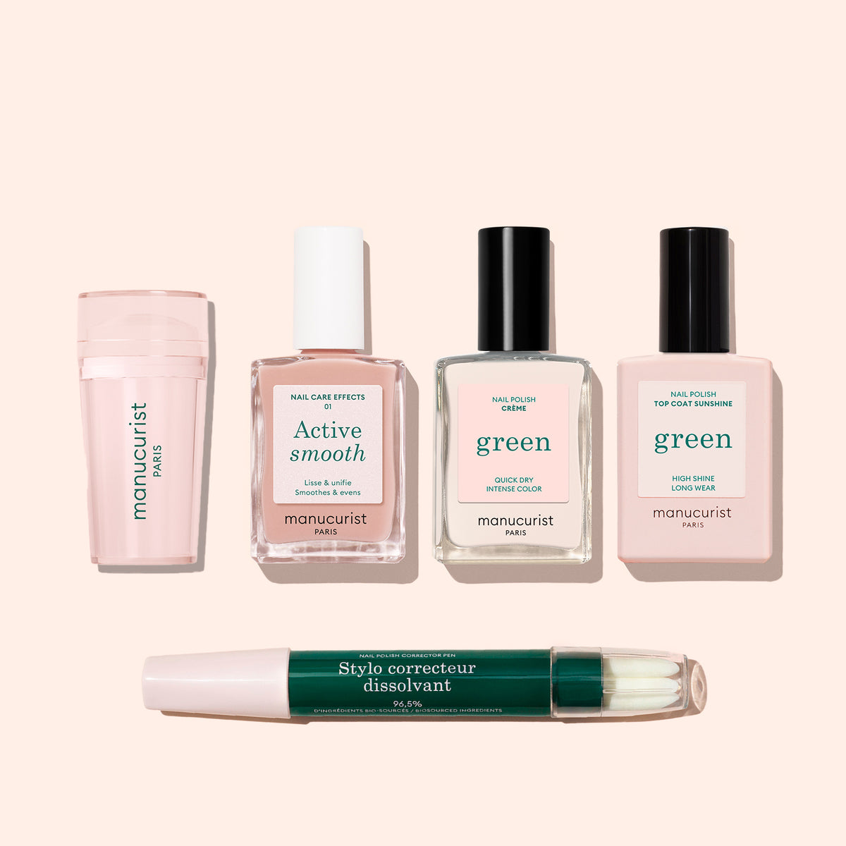 The Manucurist French Active™ Kit features five manicure essentials, including "Active Smooth," "Green" polish and top coat, plus a dual-ended corrector pen, all arranged on a light beige background—perfect for elegant French tips.