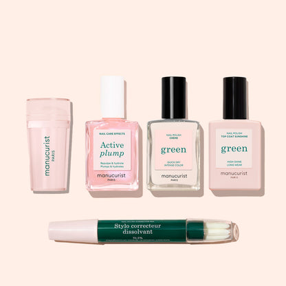 Five Manucurist French Active™ Kit essentials—nail polish remover, cuticle serum, two clear polishes, and a green pen-style corrector—are displayed on a light background, perfect for achieving flawless French tips.