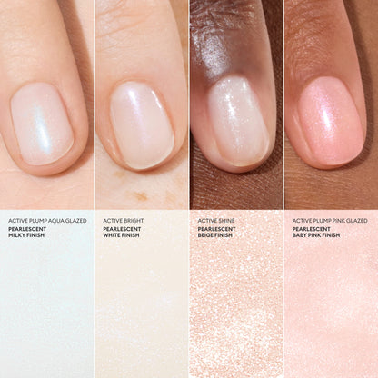 Four manicured fingernails display different shades of Manucurist Active™ Bright bio-based nail polish—milky, white, beige, and pink—each with a glossy finish on various skin tones, beautifully showcasing a healthier nail care alternative.