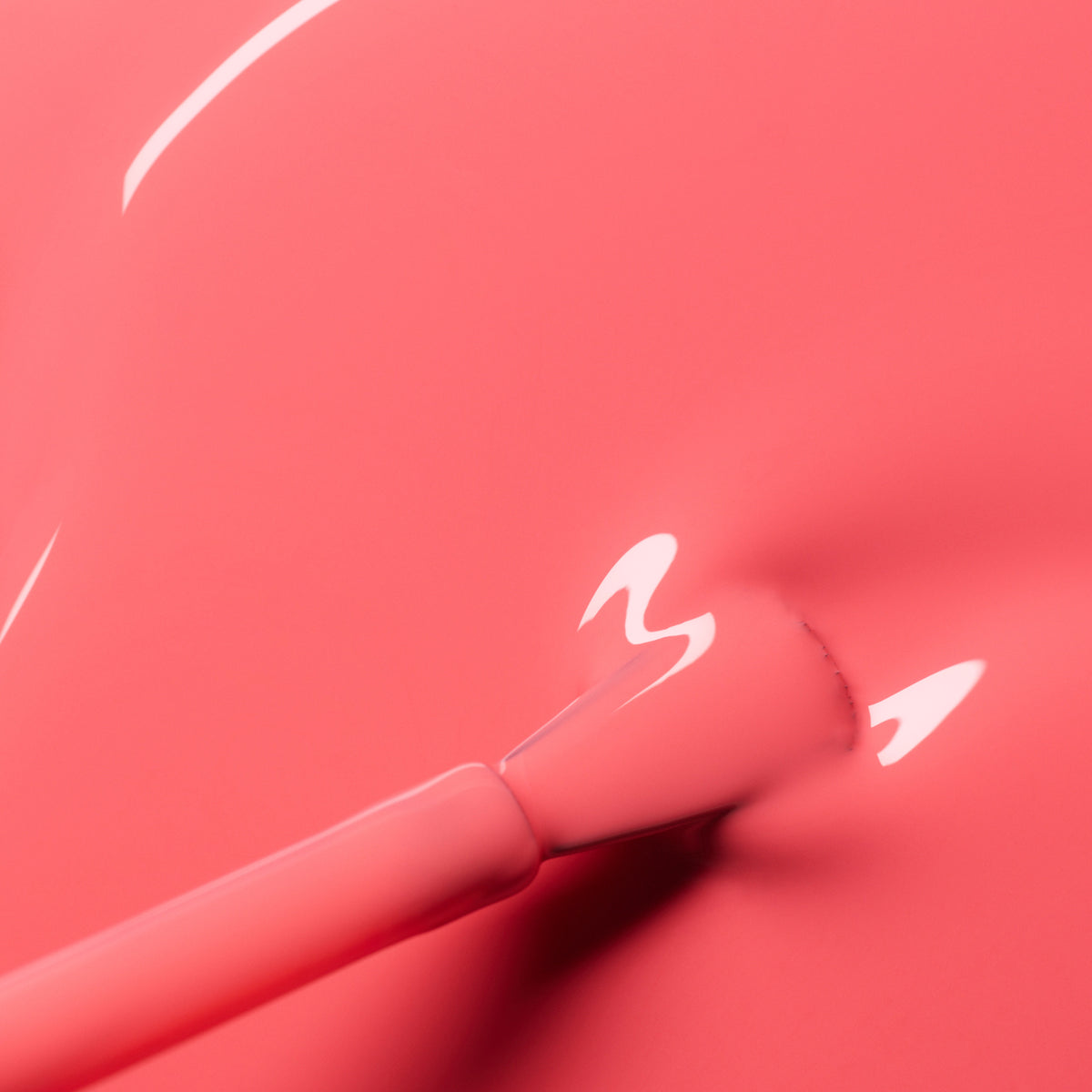A close-up of a brush applying Manucurist&