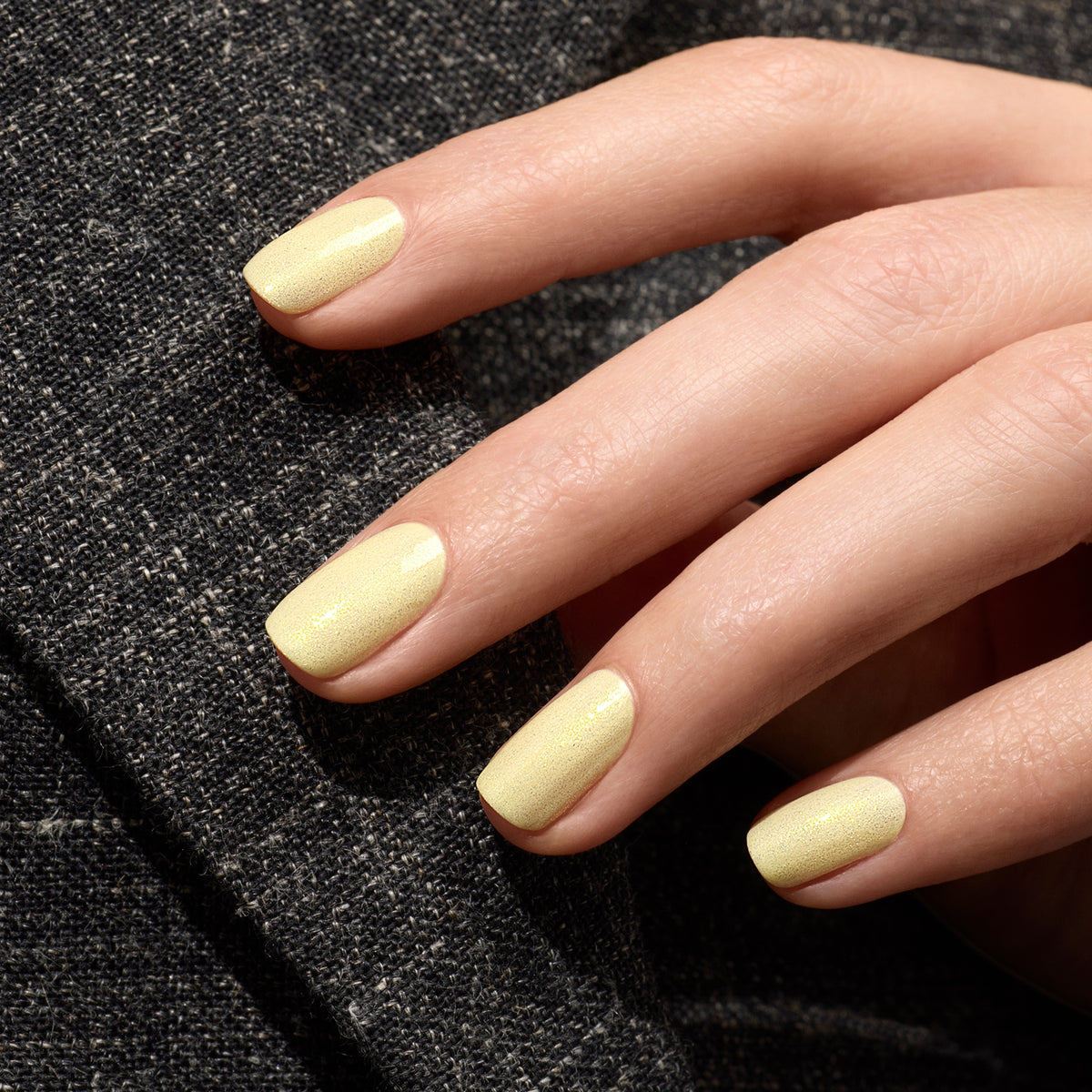 A close-up of neatly manicured nails painted with Manucurist&