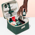 The Manucurist-test Vanity Case is a green manicure kit with nail care tools, polishes, hand cream, and accessories in a zippered pouch—a compact organizer. A hand holds a “green flash” polish.