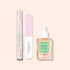 Three Glow Routine manicure essentials by Manucurist on a beige background: a clear peeling gel pen, a pink and white nail file, and a dropper bottle of cuticle oil for glossy nails and expert care.
