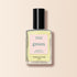 A bottle of Manucurist nail polish in the shade Lemonade, featuring a pale yellow color, black cap, and square label with “green” and “quick dry intense color.”.