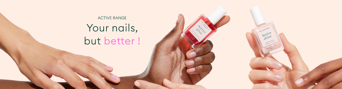 Four hands of different skin tones hold and display bottles of nail treatment polish, with the text ACTIVE RANGE Your nails, but better! on a light pink background.