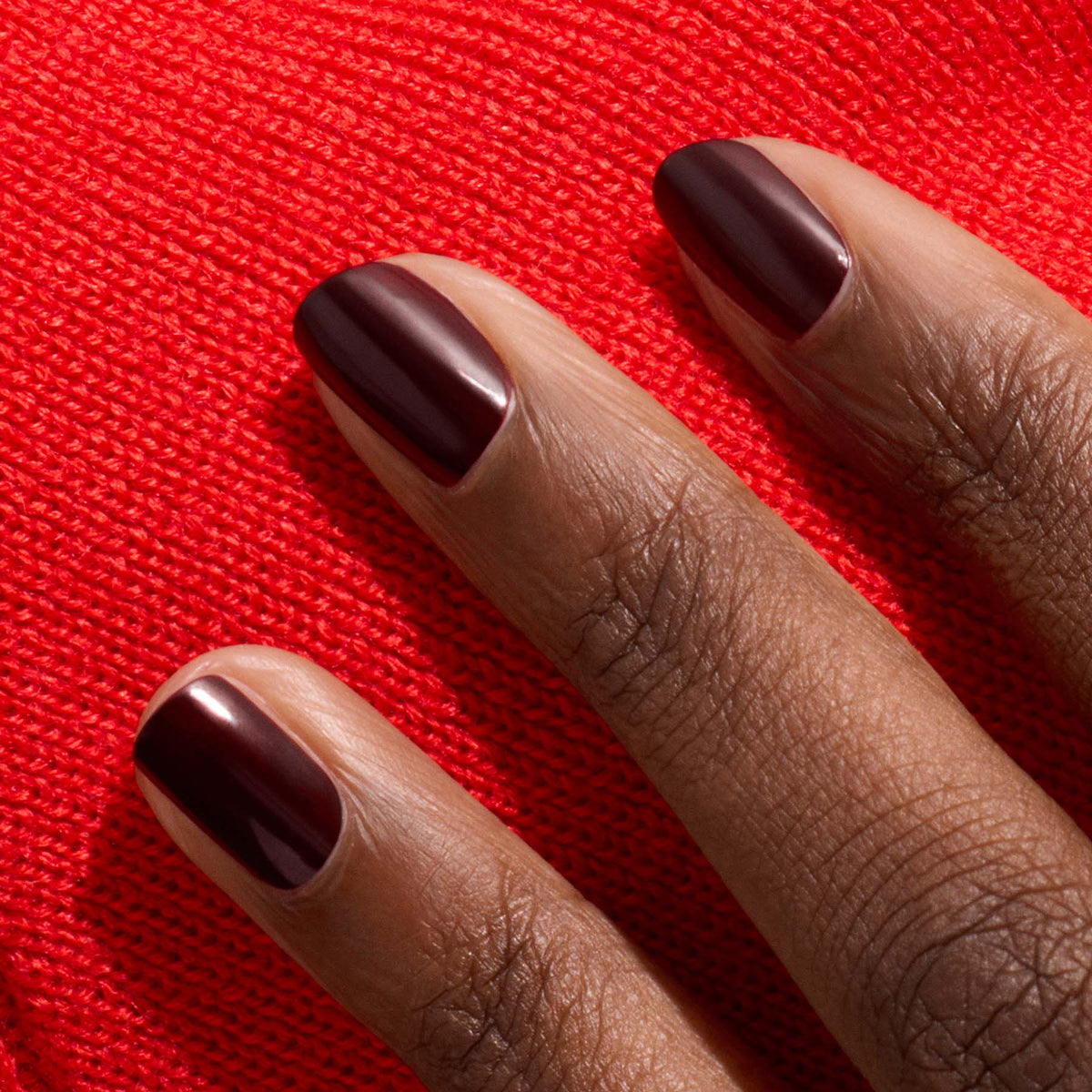Three neatly manicured short nails in Manucurist&