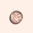 A round metal tin of Manucurist&