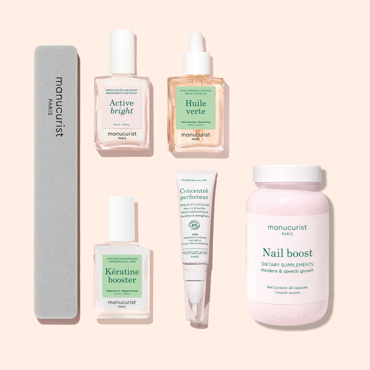 Le coffret Routine Ultime - Ongles Jaunes de Manucurist réunit cinq indispensables du soin des ongles soigneusement disposés — limes, sérums, compléments et crèmes — sur un fond clair, parfait pour renforcer et illuminer vos ongles.