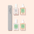 Quatre produits du set Manucurist Ultimate Routine - Yellow Nails et une lime à ongles grise sont soigneusement disposés sur un fond beige clair. Idéal pour renforcer et illuminer les ongles, le set comprend Active Bright, Huile Verte, Kératine Booster et Sérum Complet dans des flacons transparents.