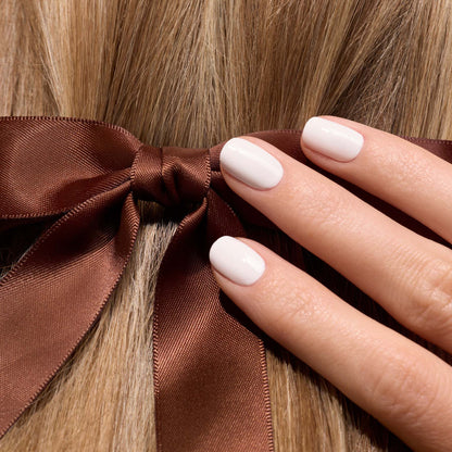 A close-up of a hand with neatly manicured nails in Manucurist&