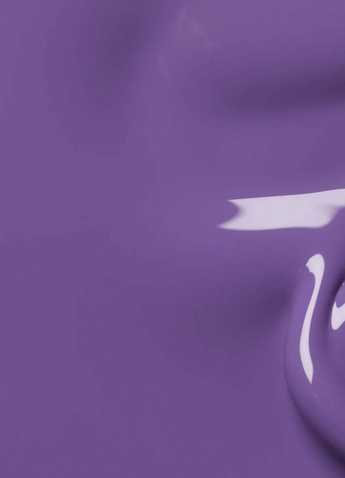 A close-up view of glossy purple paint with a shiny, smooth surface and a reflective highlight.