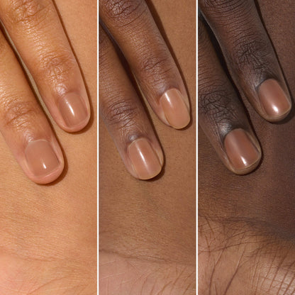 Three hands with varied skin tones display neatly manicured nails painted in Manucurist&