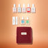 The Manucurist Active™ Super Starter Gift Set makes a perfect holiday gift, featuring six nail polish bottles, two cuticle treatments, two nail files, a cuticle pusher, and a burgundy velvet pouch—all beautifully arranged on a peach-colored background to help you achieve beautiful nails as part of your manicure routine.