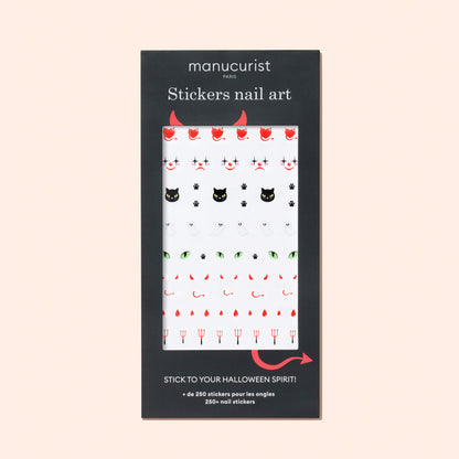 Manucurist Halloween Nail Art Stickers feature spooky designs like black cats, devil horns, pitchforks, and bloody drips on a white background—perfect for festive Halloween manicures.