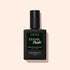 A black bottle of Manucurist Xtrem Flash™ Gel Top Coat stands against a pale pink background, featuring a dark green label with white and yellow text highlighting express removal and flawless wear.