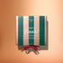 Centered against a peach background, the Manucurist Advent Calendar Time to Flash! features a square box adorned with green and pink stripes, the words “manucurist Paris Time to flash!” on the front, and is finished with a red ribbon—an ideal gift for anyone eager to explore manicure surprises or dive into the Green Flash collection.
