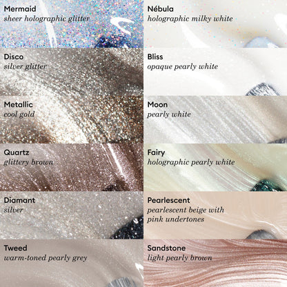 Swatches of seven white Manucurist nail polishes: Snow (pure white), Milky White, Moon (pearly), Porcelaine (creamy off-white), Fairy (holographic pearly), Shell (off-white yellow tint), and Crème (white beige).