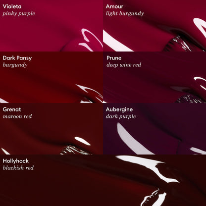 Five glossy paint swatches—Violeta, Manucurist Dark Pansy (burgundy), Prune, Hollyhock, and Aubergine—are shown on a dark background, highlighting luxe velvet reds from the Green™ range.