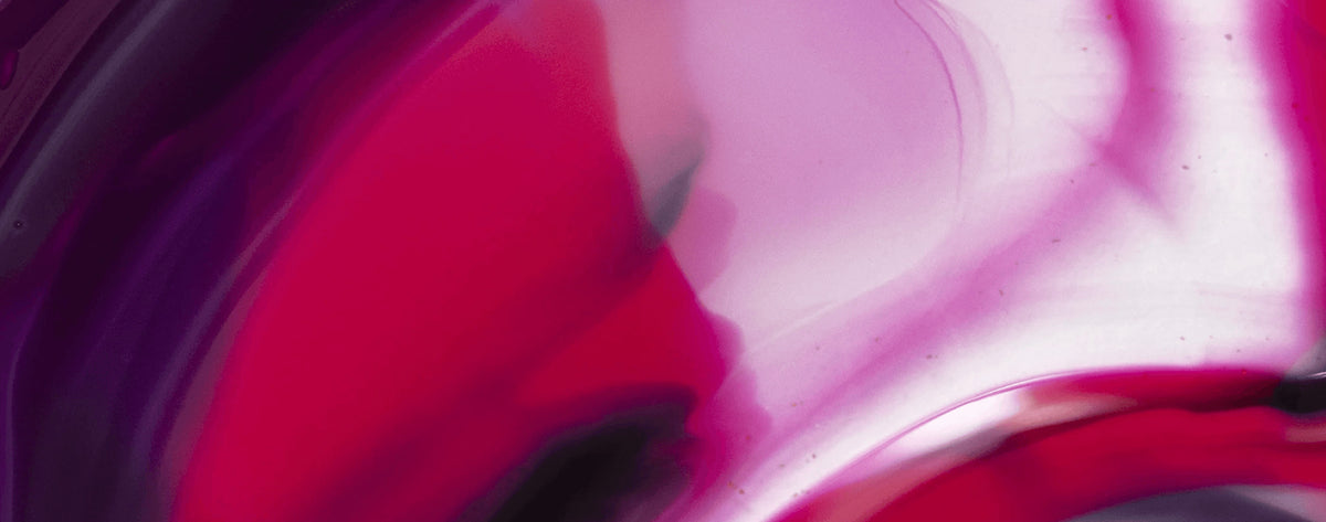 Abstract image featuring swirling shades of pink, purple, and red with smooth, flowing shapes and soft gradients blending together.