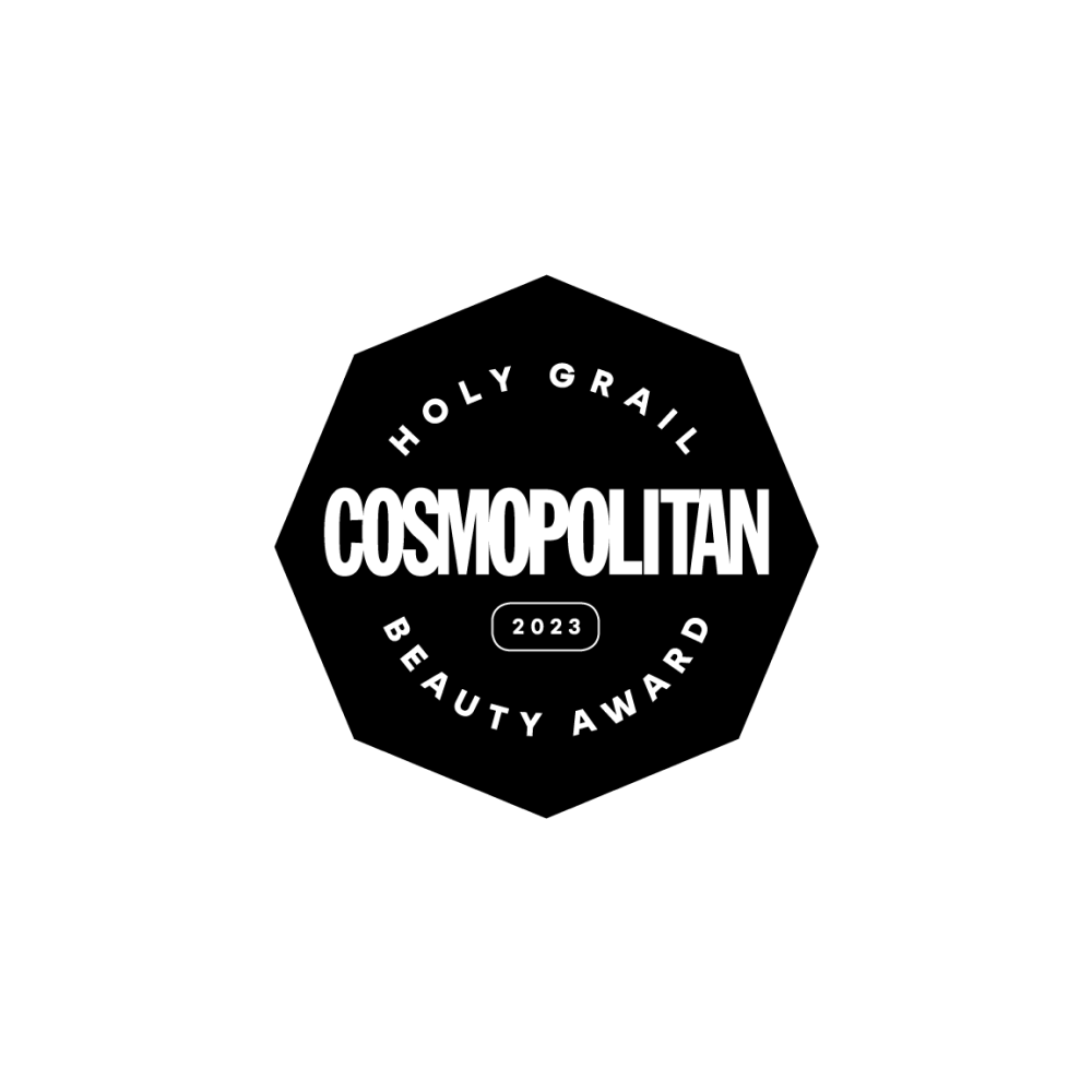 A black octagonal badge with white text reads: Cosmopolitan Holy Grail Beauty Award 2023 on a plain light background.