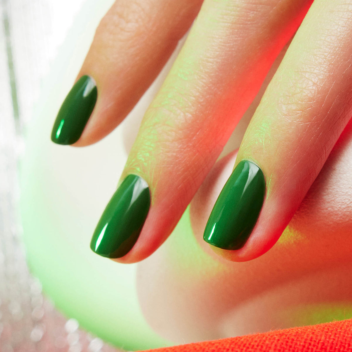 A close-up of a hand with neatly manicured nails painted in Manucurist&