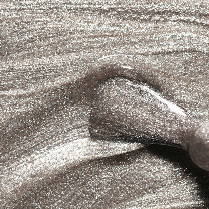Close-up of a brush applying Manucurist&