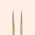 Two Manucurist Dotting Tools with metal tips and FSC wood handles are shown standing upright side by side on a light beige background, ideal for creating precise nail art designs.