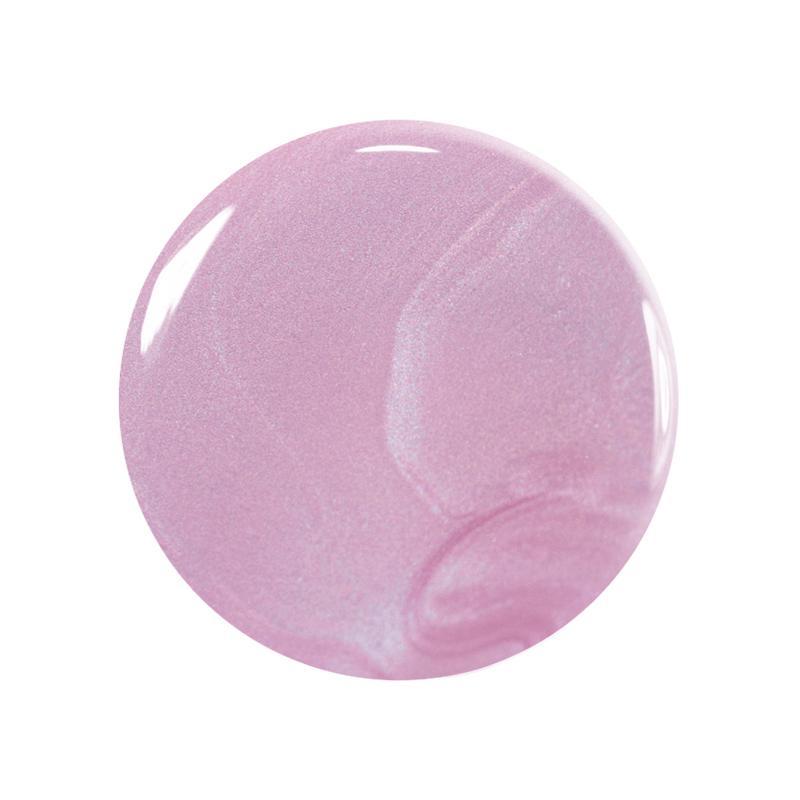 A circular swatch of shimmery pastel pink nail polish from Manucurist&