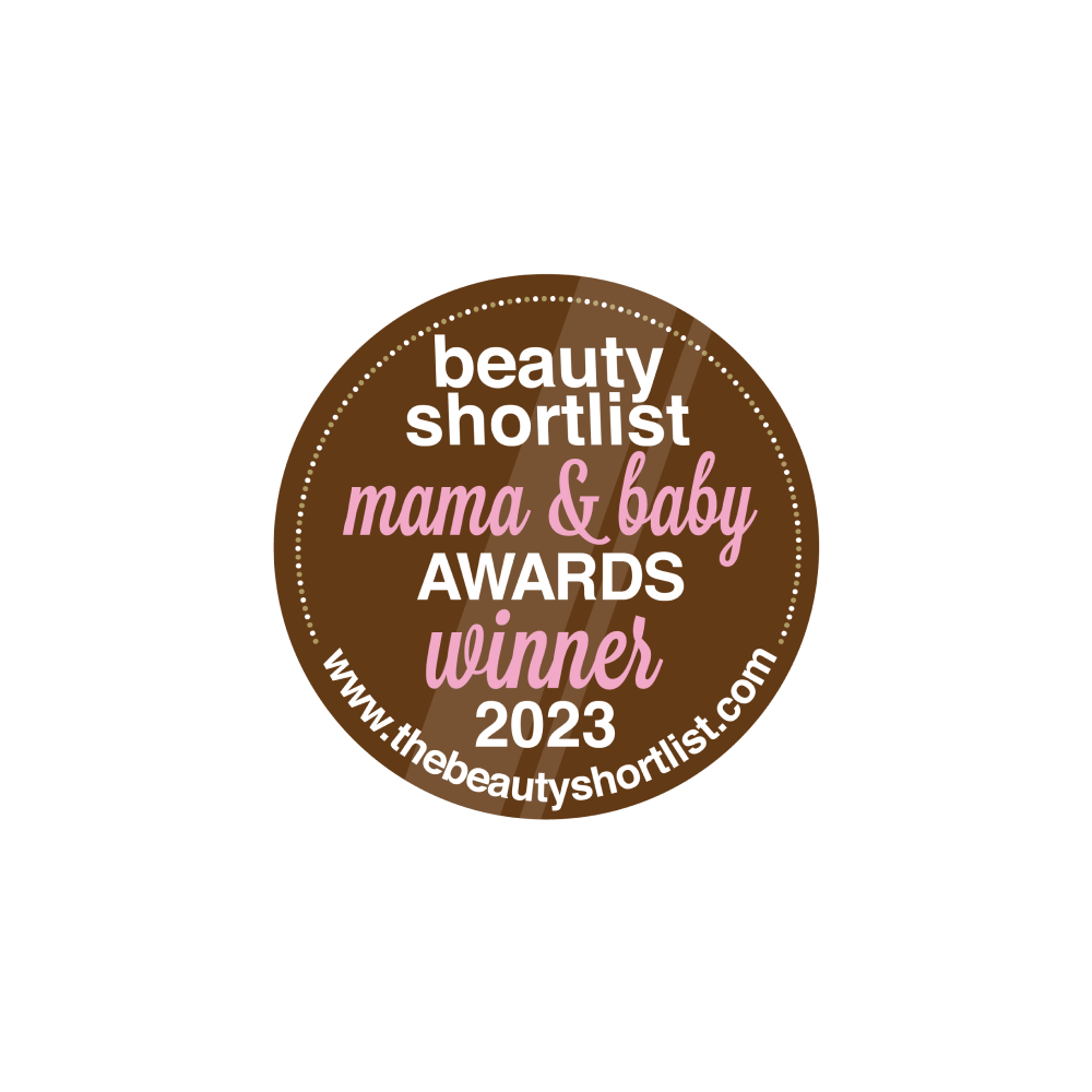 Circular badge with brown background and white and pink text that reads: beauty shortlist mama  baby AWARDS winner 2023 www.thebeautyshortlist.com.