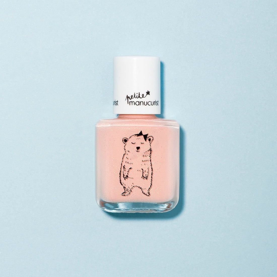 Un flacon de vernis à ongles pour enfants rose clair Manucurist Joy l&