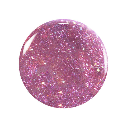 Une goutte ronde de vernis à ongles non toxique Manucurist Trio Betty Scarlett Stella aux paillettes irisées roses et au fini ultra-brillant, présentée sur fond blanc.