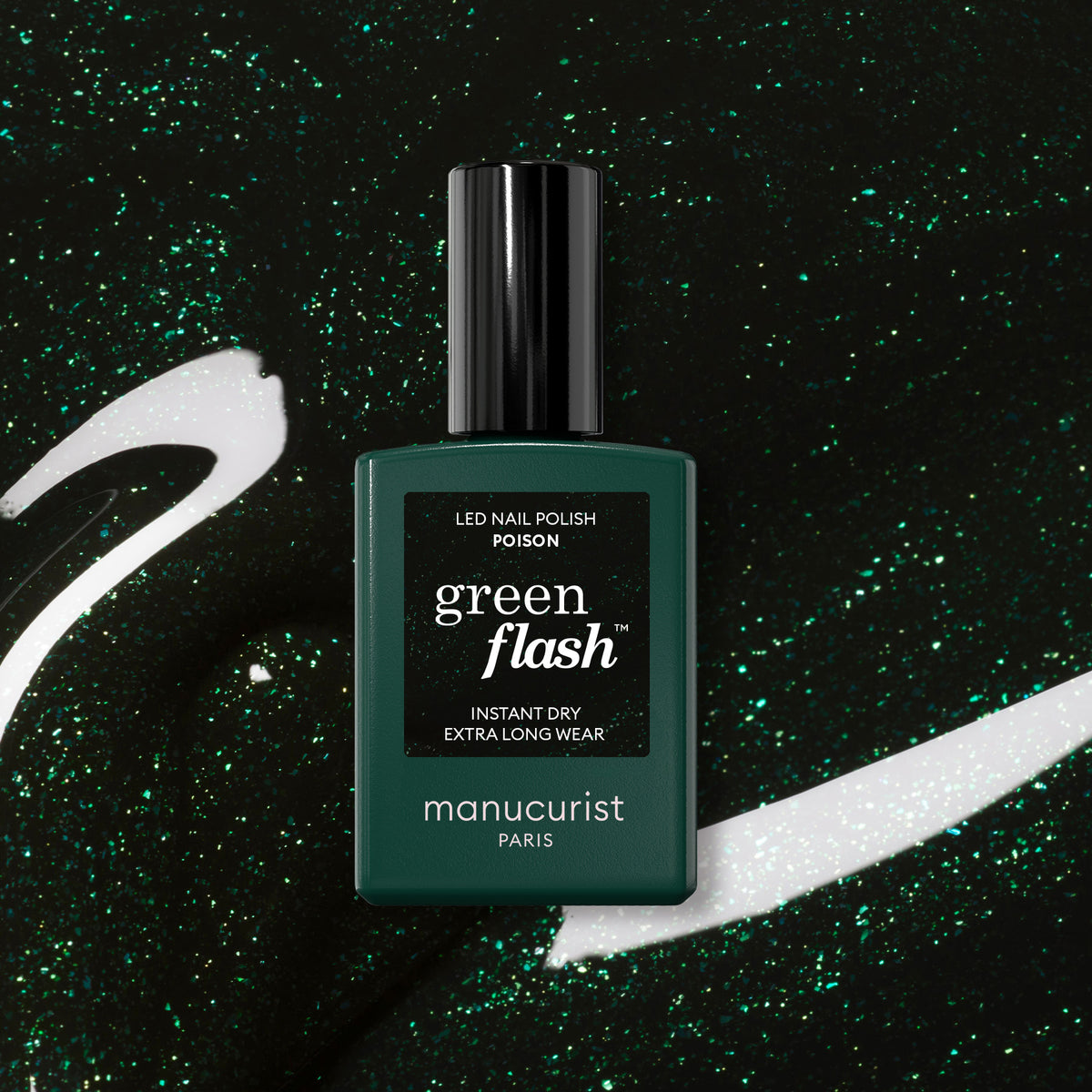 A bottle of Manucurist Poison Green Flash LED nail polish sits on a sparkly matching green background with white and green swirls. The label displays “Poison” and highlights its instant dry and extra long wear features.