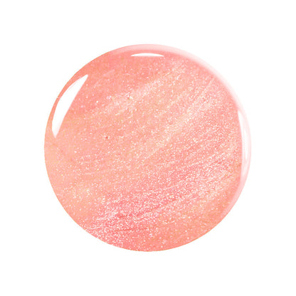 Une gouttelette ronde et brillante de vernis à ongles Betty Scarlett Stella Trio par Manucurist, couleur rose pêche au fini pailleté scintillant et à l&