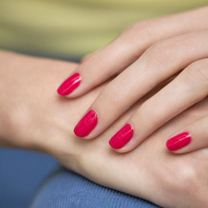 A close-up of a hand with neatly manicured nails painted in Manucurist&