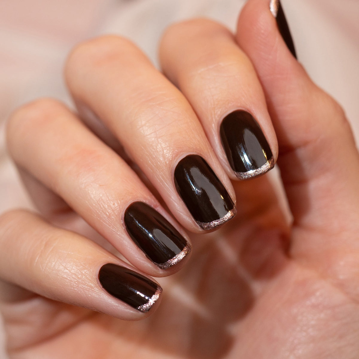 Neatly manicured nails painted with Manucurist&