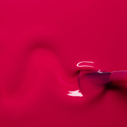 A close-up of a brush applies Manucurist&
