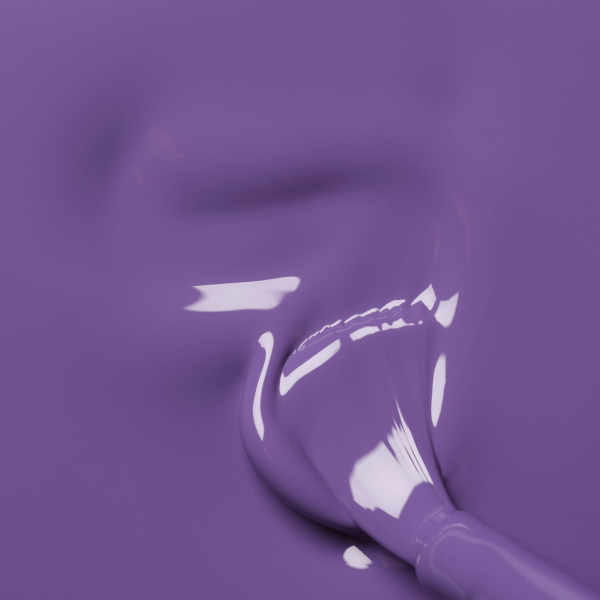 A close-up of a brush blending Manucurist&