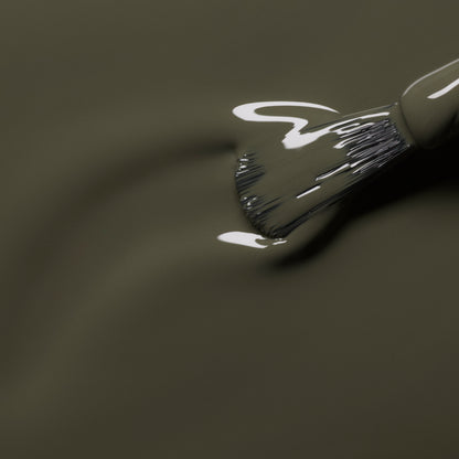 A close-up of a brush applying Manucurist&
