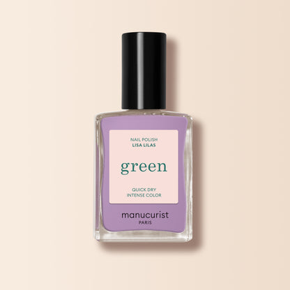 A bottle of Manucurist Lisa Lilas nail polish, featuring a black cap and lavender purple shade, from the Green™ range, set against a light beige background.