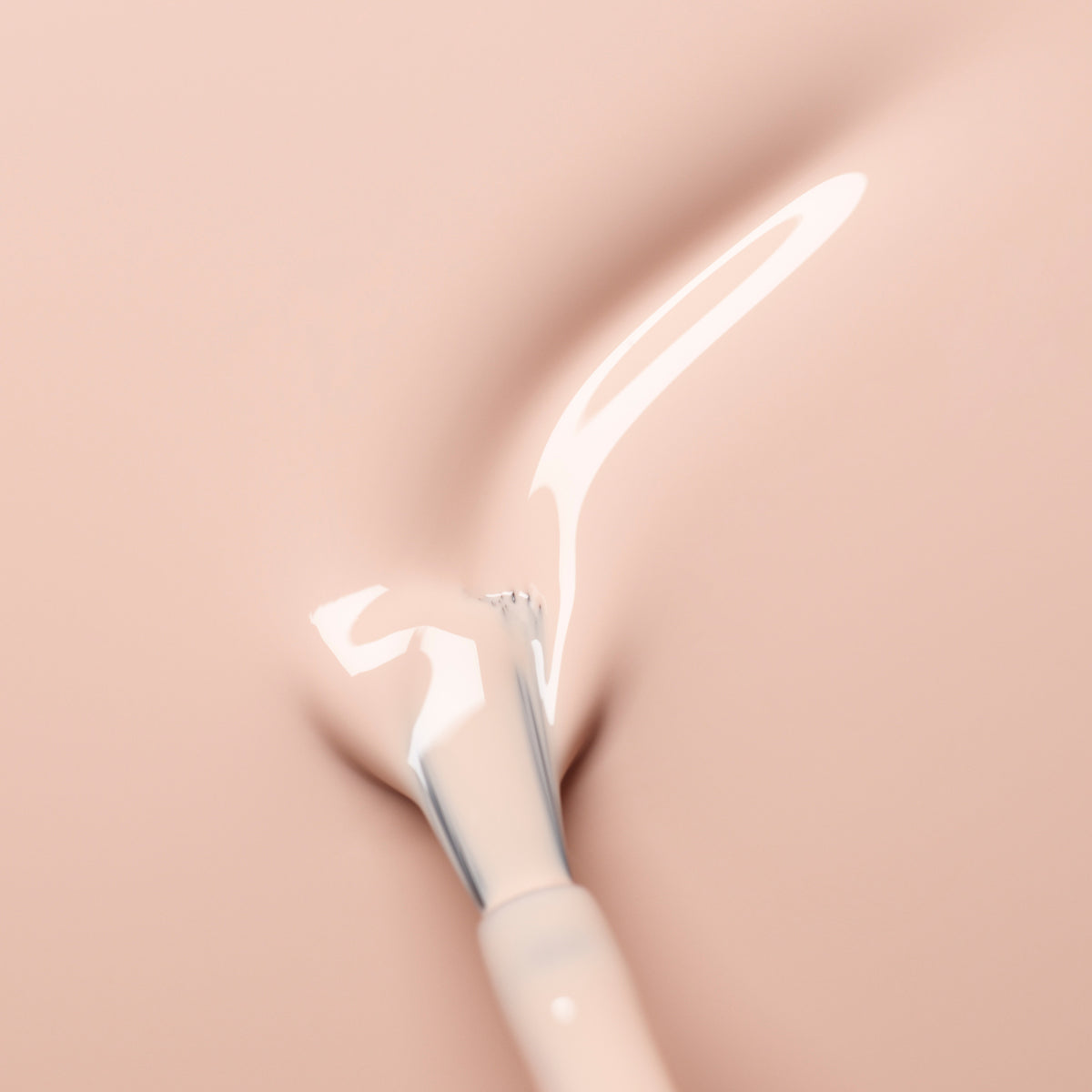 A close-up of a brush applying Manucurist&