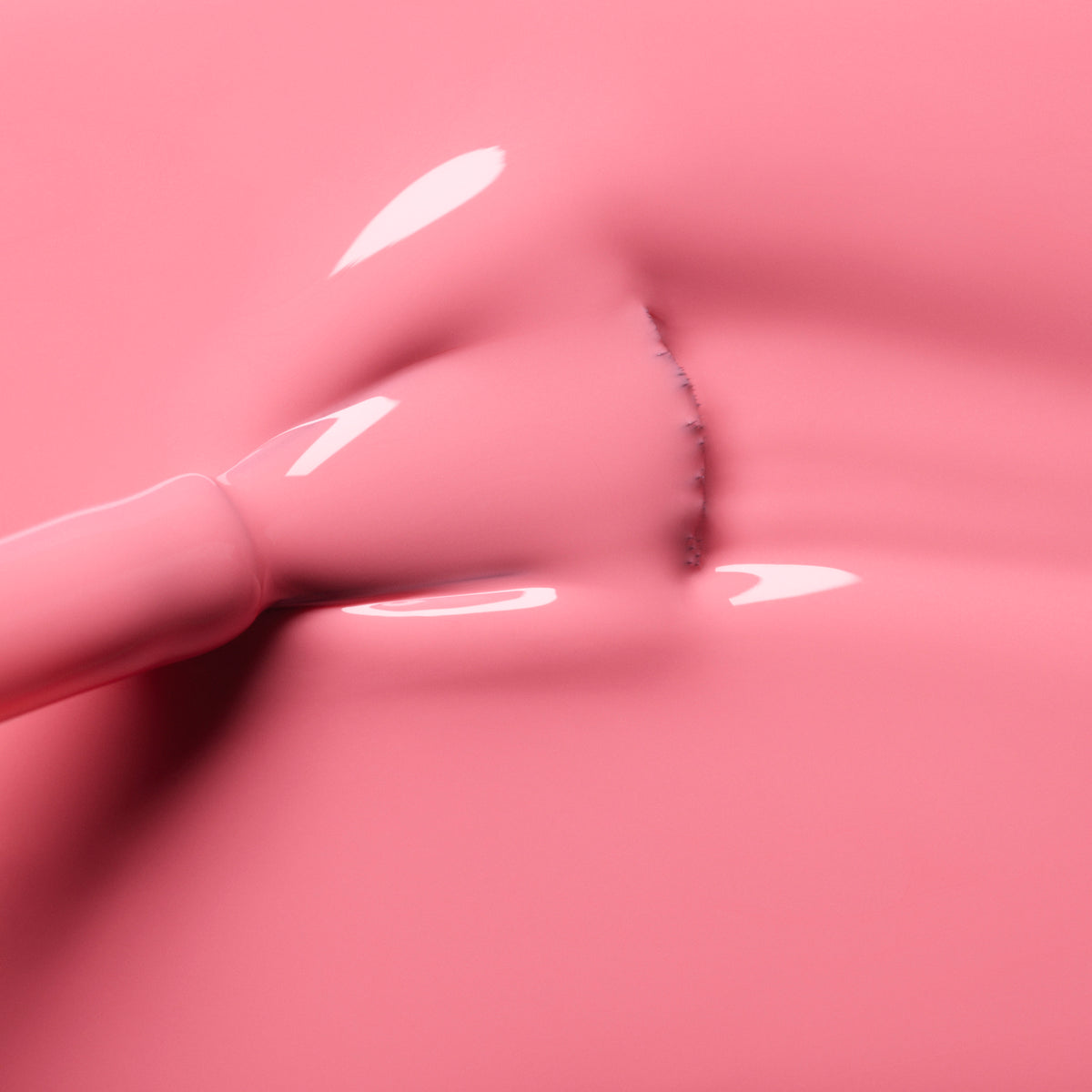 A close-up of a brush applying Manucurist&